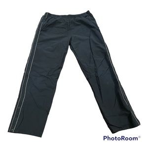 Express drawstring athletic pants with a buttoned up bottom slit